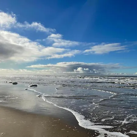 Near North Sea And Lighthouse